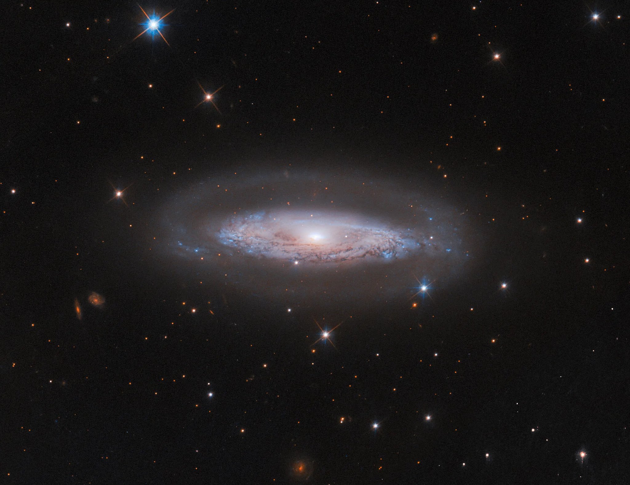 IC 4709 galaxy cluster viewed through a budget telescope under $300 on a dark night sky