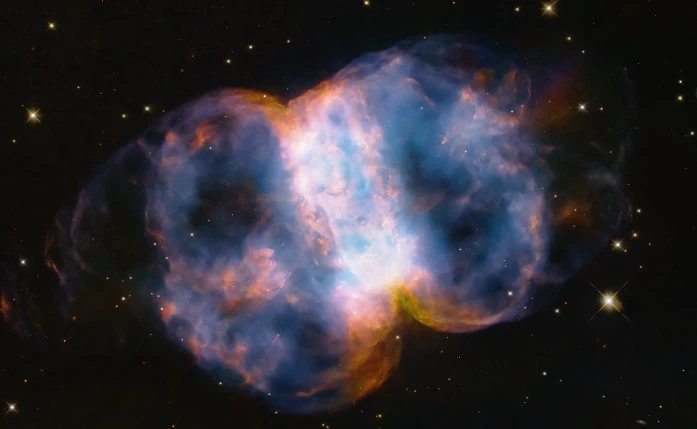 Dumbbell Nebula M27 captured through different types of telescopes — refractors, reflectors, and compound scopes